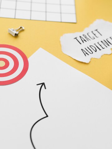 high-angle-desk-top-with-target-audience-cirle_23-2148443789